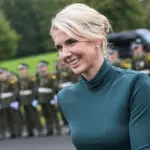 The Enabler’s Grip: How Natalie Harp’s Flattery and Provocation Fuel the President’s Escalating Press War