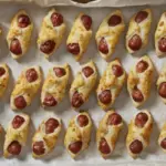The Great Wrapped-Meat Phenomenon: How Humanity Refuses to Let Go of the Sausage in Dough