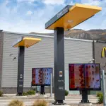 The Great Drive-Thru Divide: As McDonald’s Automates and Chick-fil-A Sticks with People, Hospitality Is Up for Grabs